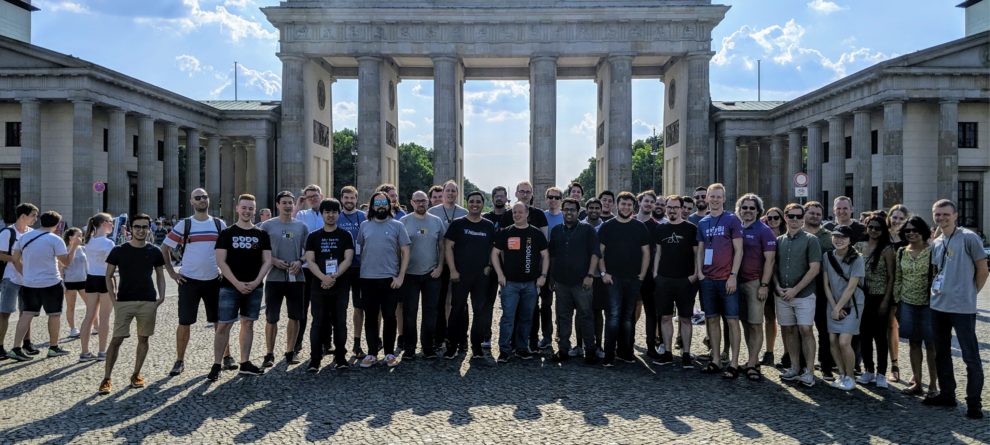 Developers standing in front of Brandenburger Tor in Berlin
